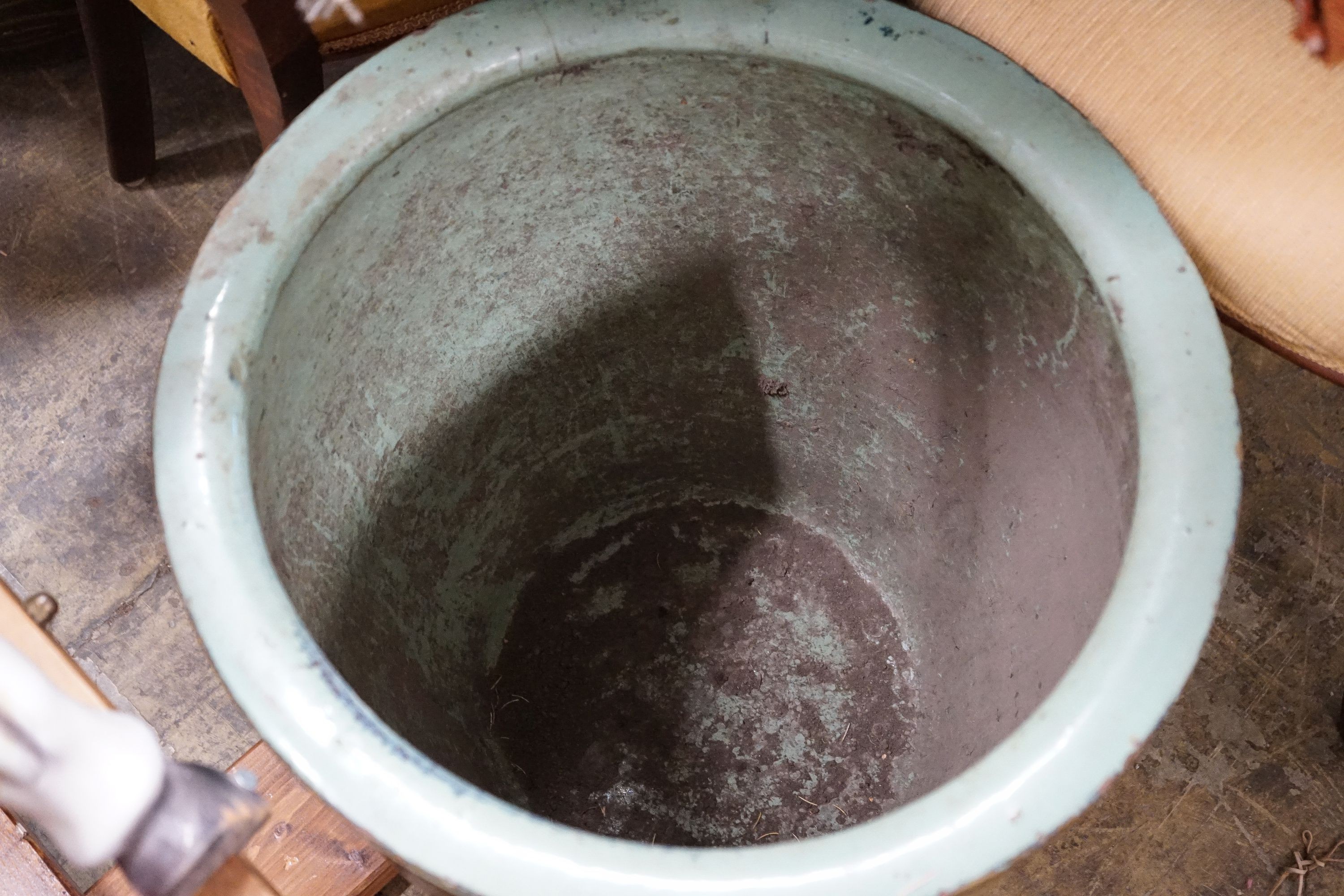 A pair of Chinese style circular glazed earthenware planters, diameter 50cm, height 47cm